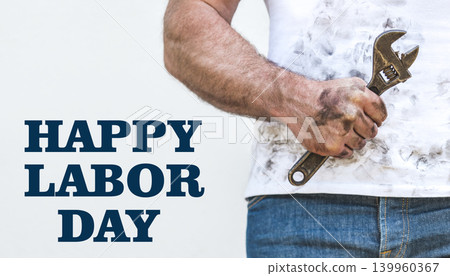 Happy Labor Day. Attractive man and hand tools Happy Labor Day. Attractive man and hand tools 139960367