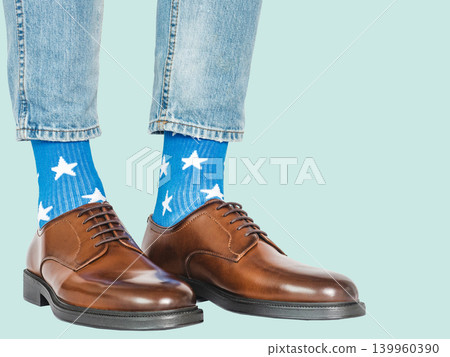 Men's legs and blue socks with white stars 139960390