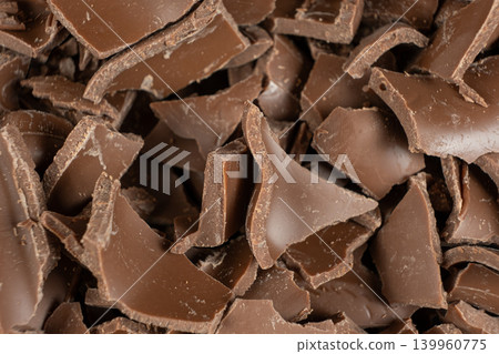 Macro texture of broken milk chocolate pieces pile background 139960775