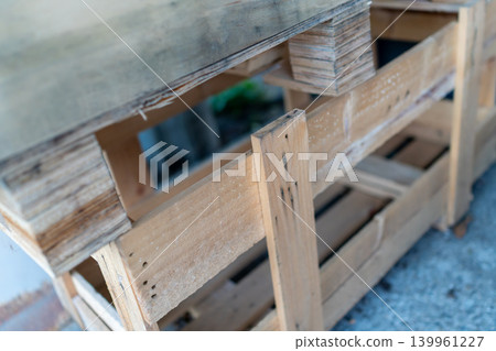 Wooden pallets and timber materials reused at construction sites Wooden pallets and timber materials reused at construction sites 139961227