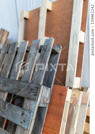 Wooden pallets and timber materials reused at construction sites Wooden pallets and timber materials reused at construction sites 139961242