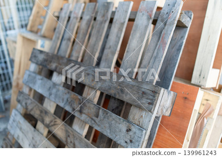 Wooden pallets and timber materials reused at construction sites Wooden pallets and timber materials reused at construction sites 139961243