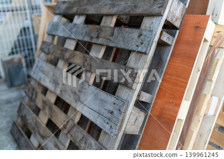 Wooden pallets and timber materials reused at construction sites Wooden pallets and timber materials reused at construction sites 139961245