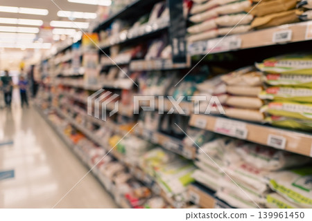A blurred image of a supermarket food section and shelves. A blurred image of a supermarket food section and shelves. 139961450