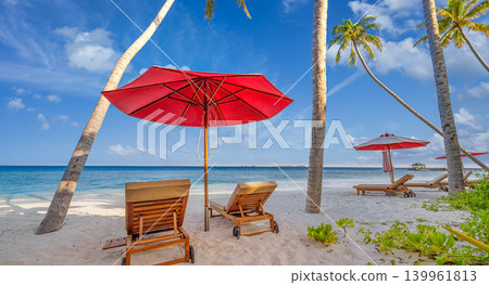 Beach sunbeds red umbrellas palm trees white sand stunning breathtaking paradise luxury resort leisure lifestyle destination summer vacation tropical coastal idyllic carefree relaxation romantic art 139961813