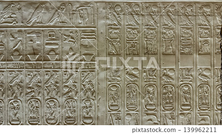 Beautiful bas-reliefs and ancient hieroglyphs in the Temple of Seti I in Abydos, Egypt. Beautiful bas-reliefs and ancient hieroglyphs in the Temple of Seti I in Abydos, Egypt. 139962211