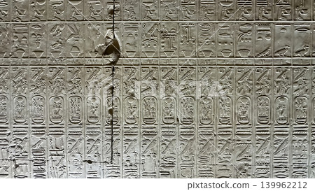 Beautiful bas-reliefs and ancient hieroglyphs in the Temple of Seti I in Abydos, Egypt. 139962212