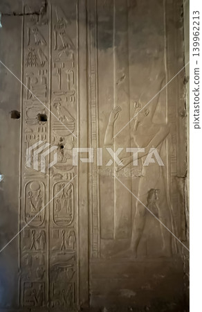 Beautiful bas-reliefs and ancient hieroglyphs in the Temple of Seti I in Abydos, Egypt. 139962213