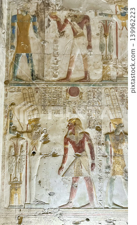 Beautiful bas-reliefs and ancient hieroglyphs in the Temple of Seti I in Abydos, Egypt. Beautiful bas-reliefs and ancient hieroglyphs in the Temple of Seti I in Abydos, Egypt. 139962223