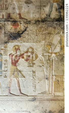 Beautiful bas-reliefs and ancient hieroglyphs in the Temple of Seti I in Abydos, Egypt. Beautiful bas-reliefs and ancient hieroglyphs in the Temple of Seti I in Abydos, Egypt. 139962224