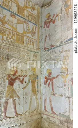 Beautiful bas-reliefs and ancient hieroglyphs in the Temple of Seti I in Abydos, Egypt. Beautiful bas-reliefs and ancient hieroglyphs in the Temple of Seti I in Abydos, Egypt. 139962228