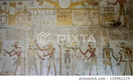 Beautiful bas-reliefs and ancient hieroglyphs in the Temple of Seti I in Abydos, Egypt. Beautiful bas-reliefs and ancient hieroglyphs in the Temple of Seti I in Abydos, Egypt. 139962229