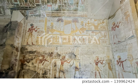 Beautiful bas-reliefs and ancient hieroglyphs in the Temple of Seti I in Abydos, Egypt. Beautiful bas-reliefs and ancient hieroglyphs in the Temple of Seti I in Abydos, Egypt. 139962424