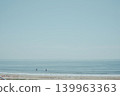 Surfers waiting for waves and the ocean scenery 139963363