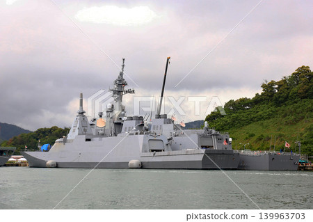 A destroyer at anchor as seen from a sightseeing boat. A destroyer at anchor as seen from a sightseeing boat. 139963703