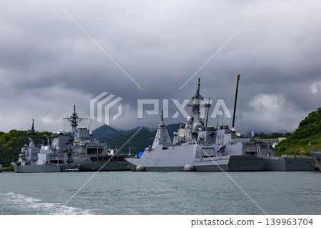 A destroyer at anchor as seen from a sightseeing boat. A destroyer at anchor as seen from a sightseeing boat. 139963704