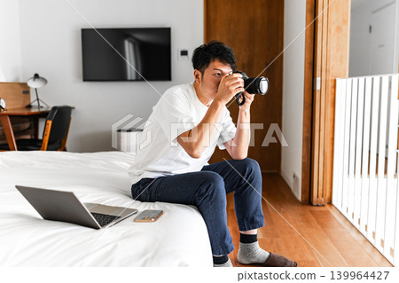 A man with a camera A man with a camera 139964427