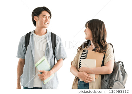 A couple, a classmate, and fellow students walking through the buildings and campuses of a university, junior college, or vocational school. 139965512