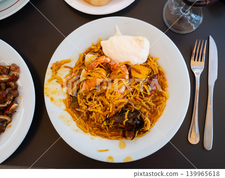 Buckwheat noodles with seafood and vegetables, close up Buckwheat noodles with seafood and vegetables, close up 139965618