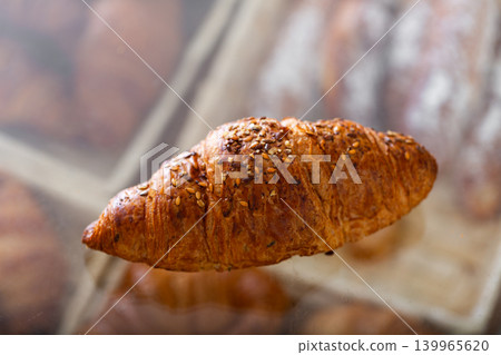 Fresh croissants on a shelf in the store Fresh croissants on a shelf in the store 139965620