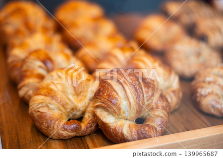 Fresh croissants on a shelf in the store Fresh croissants on a shelf in the store 139965687