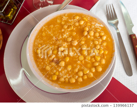 Hearty and rich soup made from chickpeas and rice Hearty and rich soup made from chickpeas and rice 139966137
