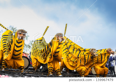 Tiger dance on the roof of Tagawa Inari Shrine's Hatsuuma Festival to ward off fire Tiger dance on the roof of Tagawa Inari Shrine's Hatsuuma Festival to ward off fire 139967479