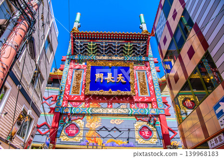 Yokohama Cityscape, Japan: Yokohama Chinatown, Tenchomon Gate. Kanteibyo Street, lined with popular fortune-telling shops. Yokohama Cityscape, Japan: Yokohama Chinatown, Tenchomon Gate. Kanteibyo Street, lined with popular fortune-telling shops. 139968183