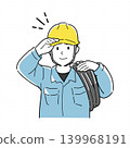 A male worker bows while holding a helmet. 139968191