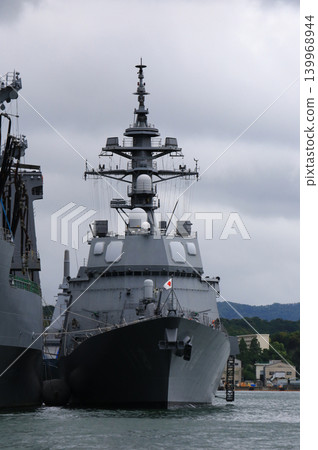 A destroyer at anchor as seen from a sightseeing boat. A destroyer at anchor as seen from a sightseeing boat. 139968944