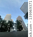 A cluster of buildings looking up at the blue sky in Shinjuku, Tokyo. 139969371