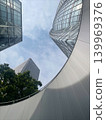 A cluster of buildings looking up at the blue sky in Shinjuku, Tokyo. 139969376