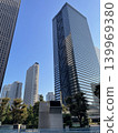 A cluster of buildings looking up at the blue sky in Shinjuku, Tokyo. 139969380