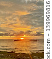 Sunset over the sea and the beautiful magic hour scenery of the sunset. 139969816