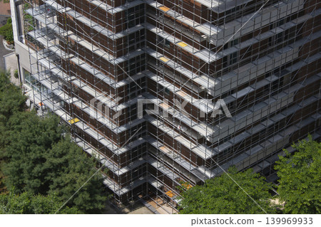 It is a building under construction. It is a building under construction. 139969933