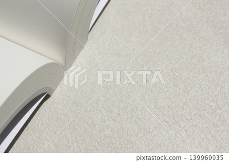 It is a close-up of an open book. It is a close-up of an open book. 139969935