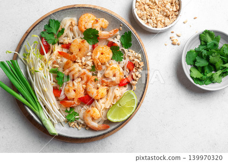Pad Thai noodles with shrimps, prawns. Traditional thai meal. Pad Thai noodles with shrimps, prawns. Traditional thai meal. 139970320