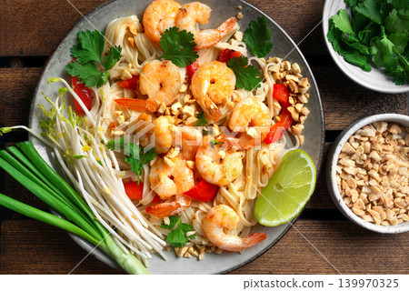 Pad Thai noodles with shrimps, prawns. Traditional thai meal. Pad Thai noodles with shrimps, prawns. Traditional thai meal. 139970325