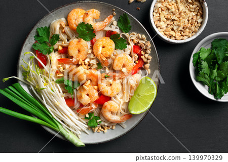Pad Thai noodles with shrimps, prawns. Traditional thai meal. Pad Thai noodles with shrimps, prawns. Traditional thai meal. 139970329