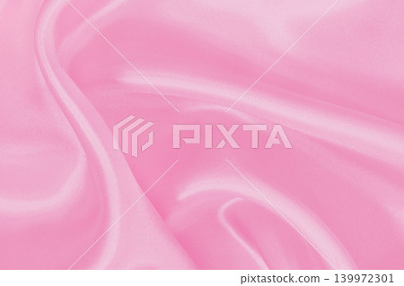 Pink fabric cloth texture for background and design art work, beautiful crumpled pattern of silk or linen. Pink fabric cloth texture for background and design art work, beautiful crumpled pattern of silk or linen. 139972301