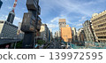 The streetscape around Ginza and Shimbashi, and the distinctive architecture of the Shizuoka Shimbun Tokyo Branch Office building. 139972595