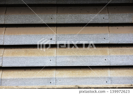 Louver Metal Sheet Ventilation Shutter Pattern, A photo of repeating metal slats, showing texture, depth, and functional airflow design in an industrial surface. 139972623