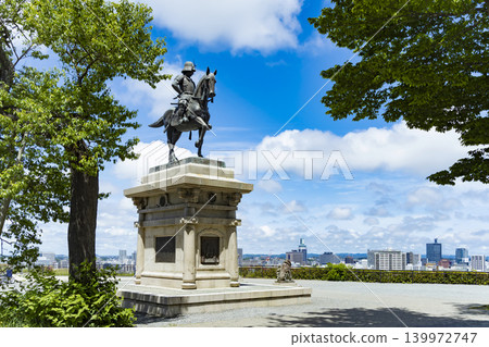 Fresh greenery and the equestrian statue of Date Masamune Fresh greenery and the equestrian statue of Date Masamune 139972747