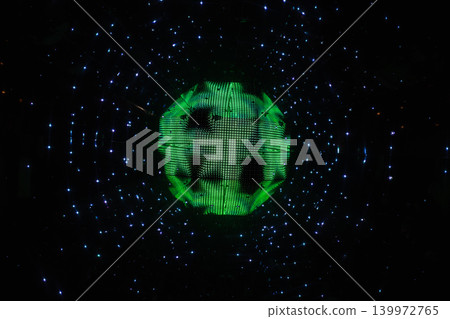 Defocused glowing green sphere surrounded by blue light particles Defocused glowing green sphere surrounded by blue light particles 139972765