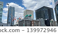 The cluster of skyscrapers around the Yaesu exit of Tokyo Station, where redevelopment is underway, and the blue sky. 139972946