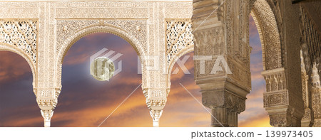 Arches in Islamic (Moorish) style (against the sunset with the super moon) in Alhambra, Granada, Spain 139973405