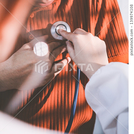 Doctor using a stethoscope checking patient with examining, presenting results symptom and recommend treatment method, Healthcare and medical concept Doctor using a stethoscope checking patient with examining, presenting results symptom and recommend treatment method, Healthcare and medical concept 139974108