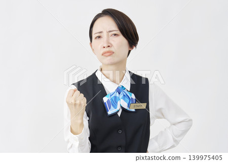 Angry female staff member (receptionist/bank employee) - white background Angry female staff member (receptionist/bank employee) - white background 139975405