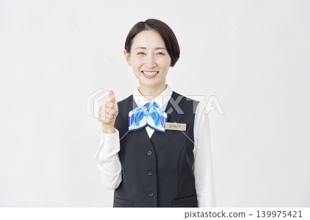 Female staff member, receptionist/bank employee, good sign, white background Female staff member, receptionist/bank employee, good sign, white background 139975421