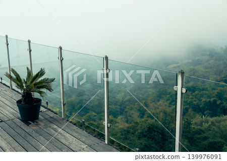 Balcony view of greenery and fog in Kintamani Bali Balcony view of greenery and fog in Kintamani Bali 139976091